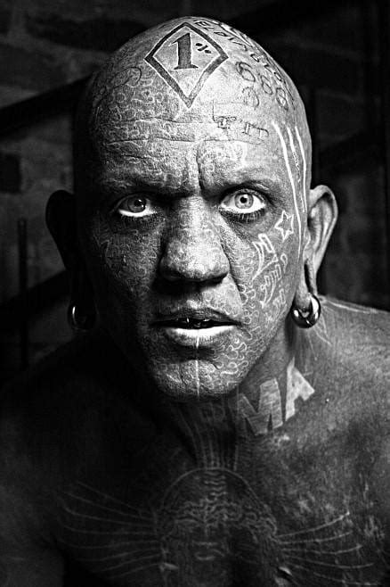 Angelo Piovano, the world's most tattooed man poses for