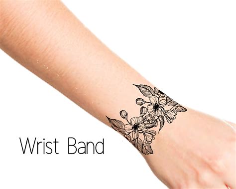 Wrapped Around Wrist Tattoo