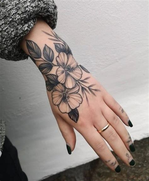 Black Wrist And Hand Tattoo Best tattoo design ideas