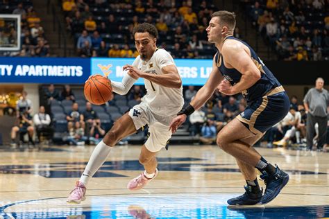 March towards Glory: Witness the Thrilling Wvu Basketball Game Today