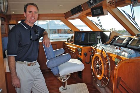 Yacht captain at helm