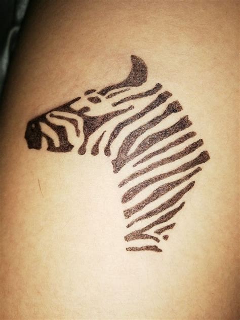 Zebra Tattoo And Body Piercing