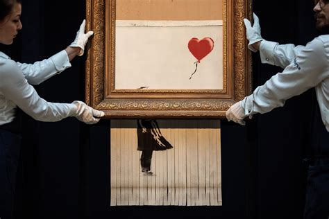 a banksy painting shreds itself