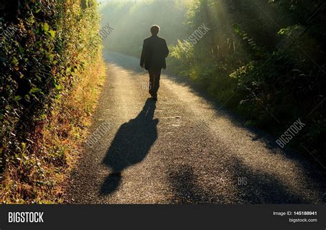 a guy walking alone