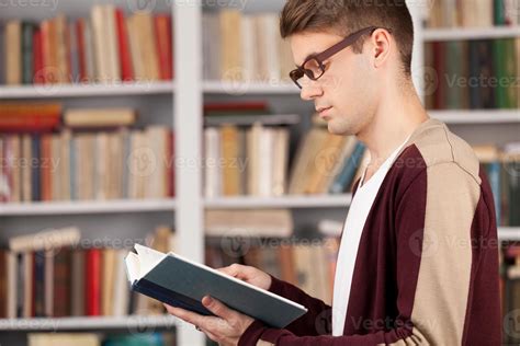 A Man Reading A Book