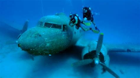 a plane submerged in the water video