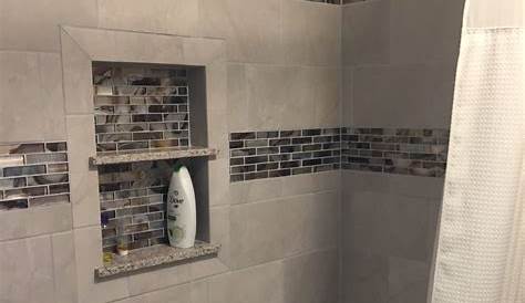 bathtub with tile and tile accent Bathroom remodel shower, Bathtub
