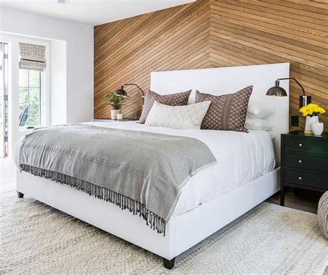 Master bedroom with stacked stone accent wall and