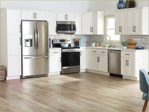 This kitchen features two different colored to add a little