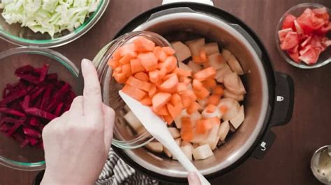 adding ingredients to pressure cooker