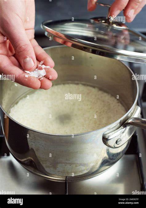Adding Salt and Optional Ingredients to Rice