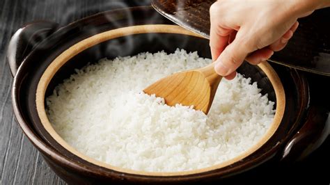 adding salt to rice