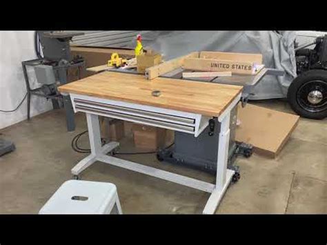 adjustable outfeed table