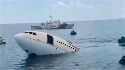 airplane sinking in water