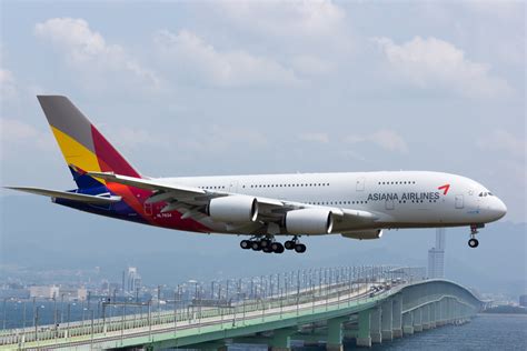 Asiana Airbus A380800 Taking Off from LAX Photograph by Erik Simonsen