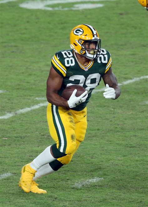 Analytics of an NFL Running Force: AJ Dillon's Performance