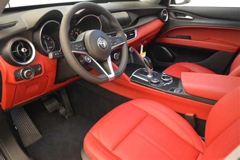 alfa romeo white with red interior