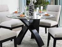 GLASS ALL BLACK DINING TABLE SET AND 6 BLACK FAUX LEATHER BLACK CHAIRS