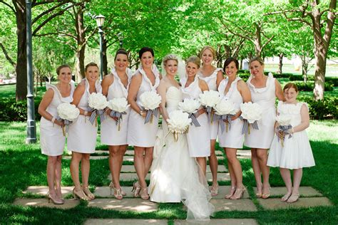 We just adore the look of an allwhite bridal party! Who's with us? in