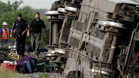 amtrak train hits dump truck