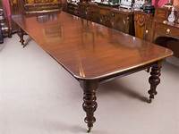 An antique Victorian mahogany extending dining table