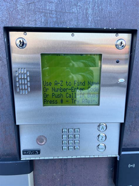 call box or buzzer at apartment building Stock Photo