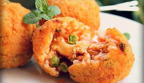 Arancini rice balls filled with cheese and ground beef
