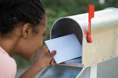 are you allowed to put a letter in someone's mailbox