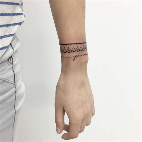 Famous Arm Bracelet Tattoo Designs 2023