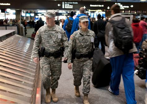 Troops keep watch at Las Vegas airport as New Year nears — PHOTOS Las