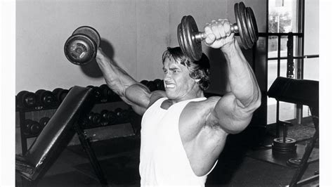 arnold schwarzenegger lifting weights