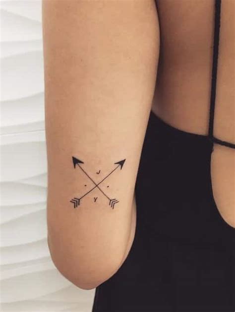 Innovative Arrows Crossing Tattoo Design 2023