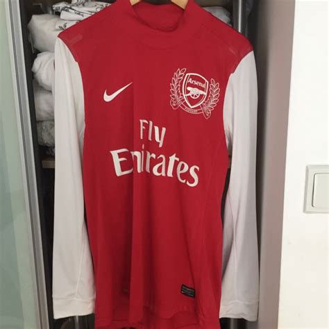arsenal player issue jersey