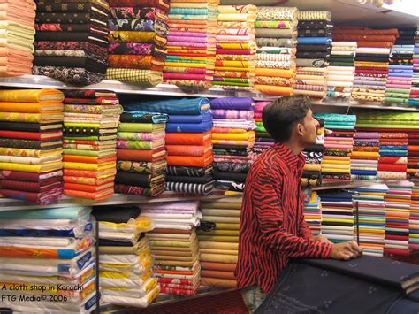 Cloth shops inside traditional bazaar market in walled city Lahore