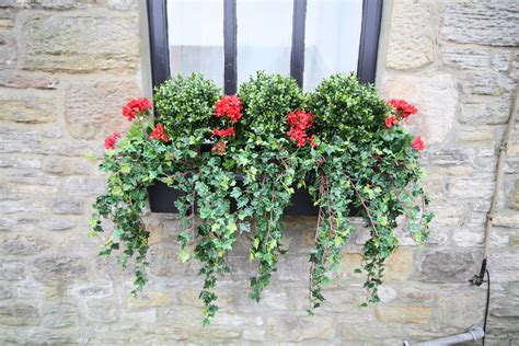 Artificial Flowers In A Window Box