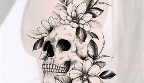 a drawing of a skull with flowers and butterflies on it's head is shown