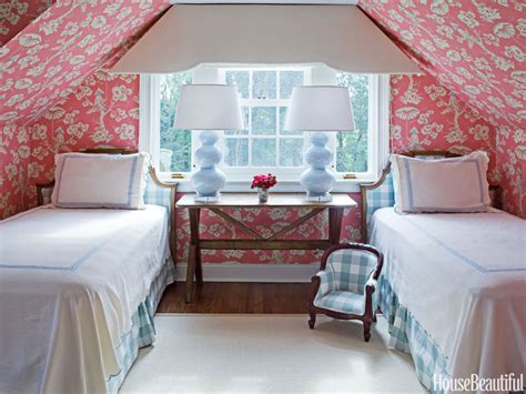 Attic bedroom with patterned wallpaper