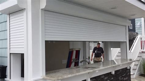 Auto Storm Shutters