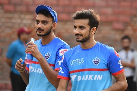 axar patel and harshal patel are brothers