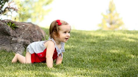 Baby Crawling in Grass