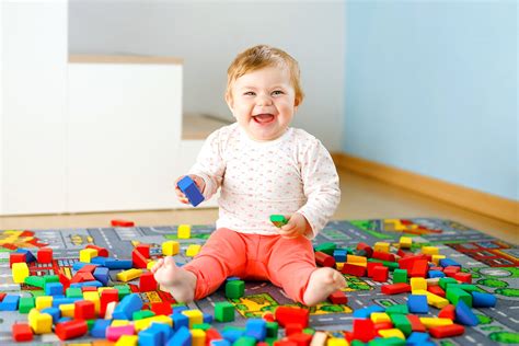 baby playing with blocks