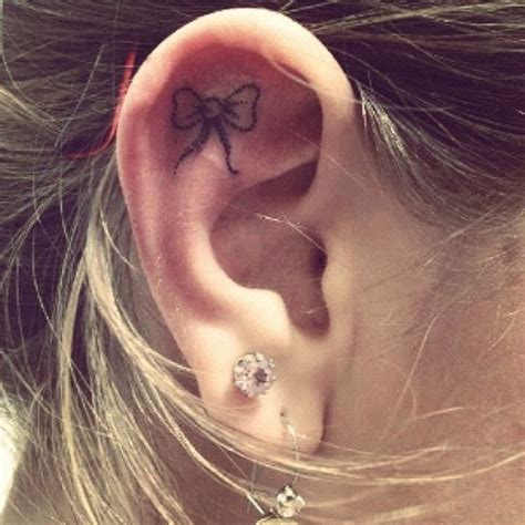 Back Of Earlobe Tattoo