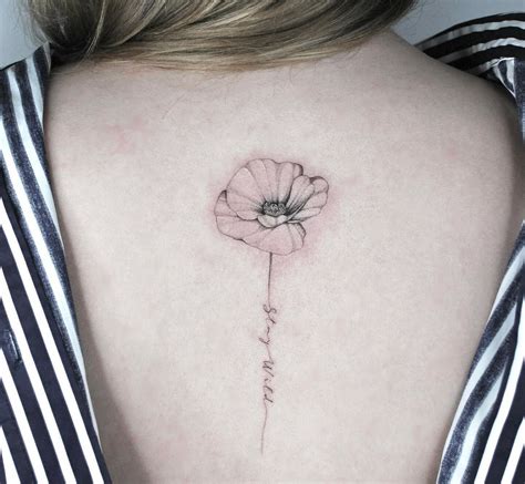 Back Tattoos Of Flowers