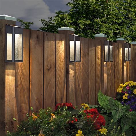 Up / Down Sconce Lighting on the Fence created dramatic and beautiful