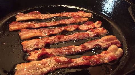 Bacon sizzling on a pan
