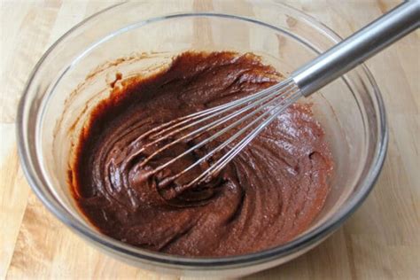 Image of a baker mixing brownie batter.