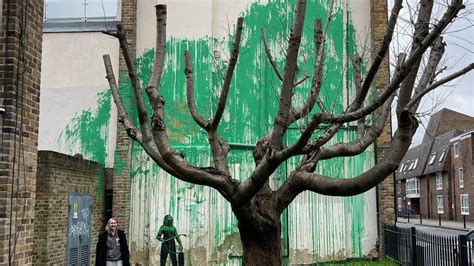 banksy london tree mural