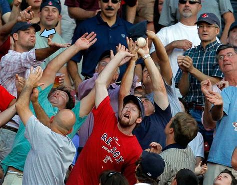 baseball fan catches foul ball