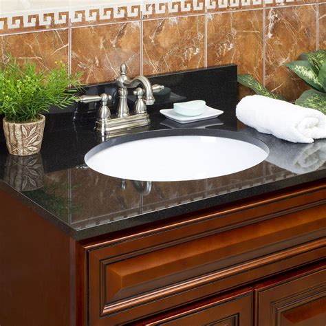 bath vanity with black granite top