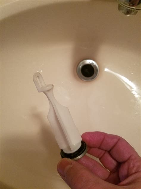 bathroom sink stopper came out
